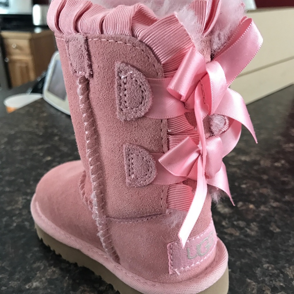 UGG Bailey Bow ruffle boots.